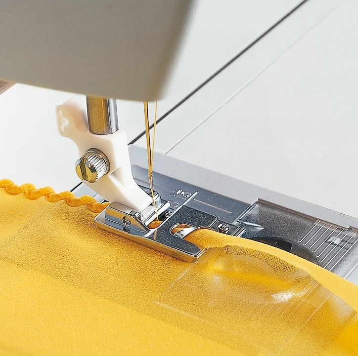 Husqvarna® VIKING®  Säumerfuss für 2 mm Muschelnaht Husqvarna® VIKING®  Säumerfuss für 2 mm Muschelnaht